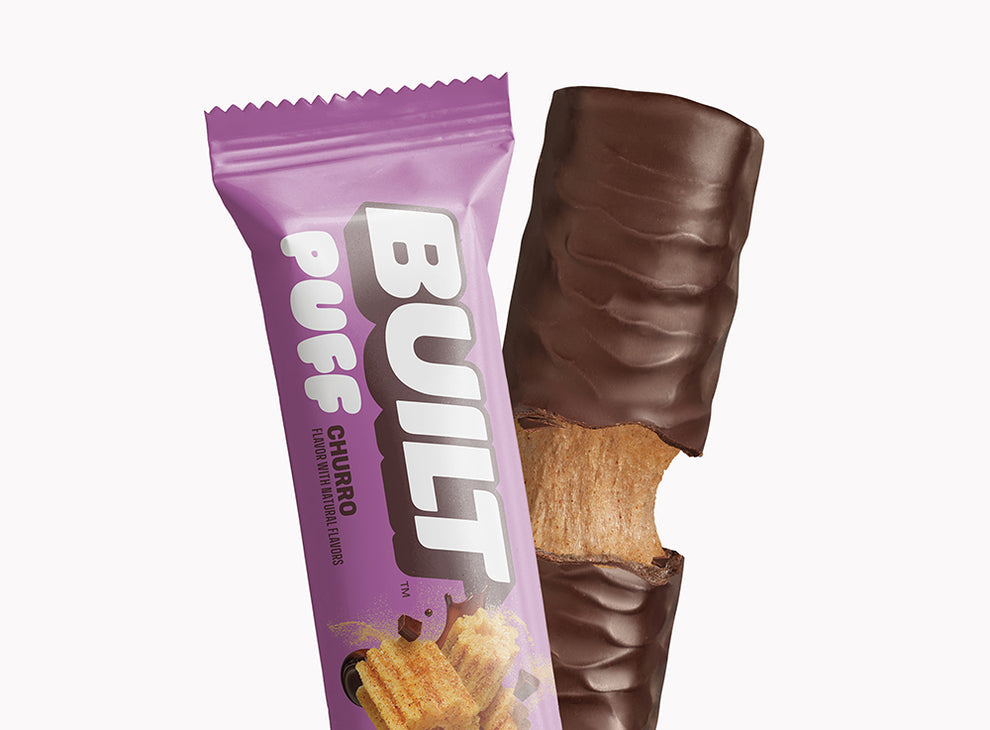 Built Bar Puffs Canada – Churro Protein Bar 40g showing chocolate coating on white background