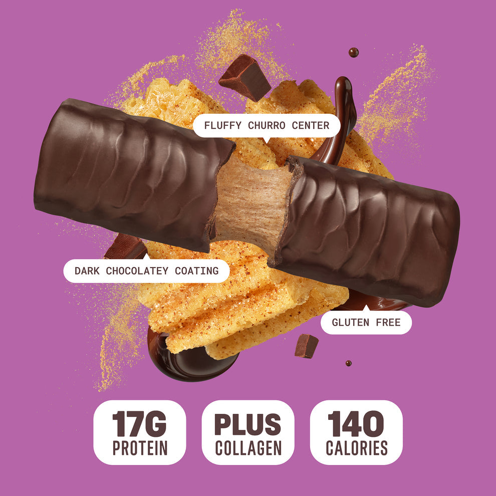 Built Bar Puffs Canada – Churro Protein Bar 40g partially unwrapped showing dark chocolatey coating  and fluffy churro center on purple background