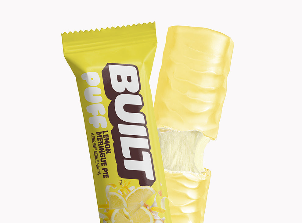 Built Bar Puffs Canada - Lemon Meringue Pie Protein Bar 40g showing  lemony coating on white background