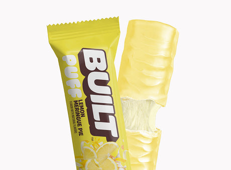 Built Bar Puffs Canada - Lemon Meringue Pie Protein Bar 40g showing  lemony coating on white background