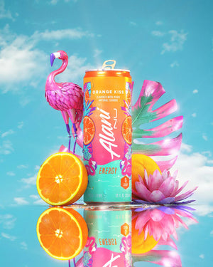 Alani Nu energy drink can with oranges and a flamingo on a reflective surface with a blue sky background