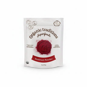 Package of Organic Traditions Beetroot Powder on a red textured background