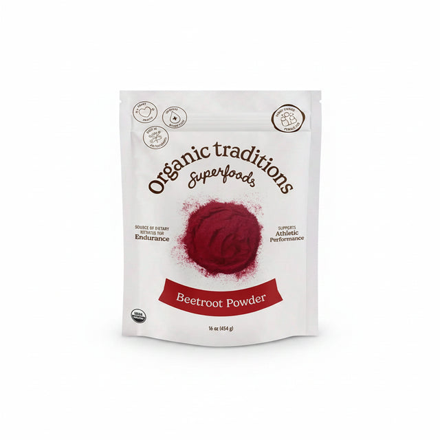 Package of Organic Traditions Beetroot Powder on a red textured background