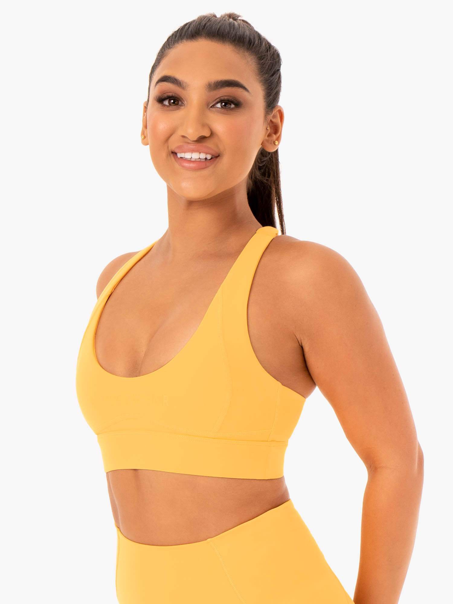Why Does My Sports Bra Roll Up In The Front? – solowomen